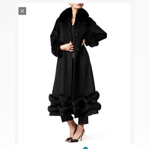 Fabulous cashmere coat with fox trim. Sold out everywhere. A head turner.